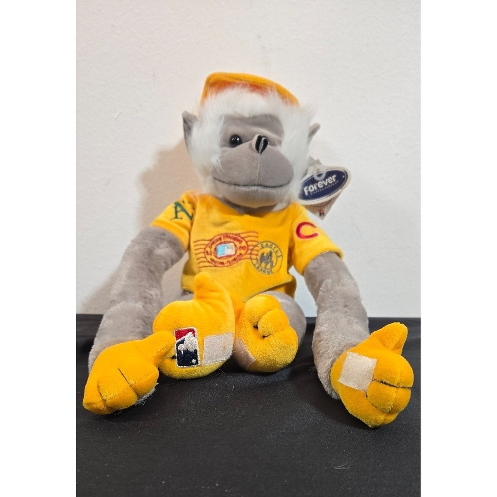 Monkey stuffed animal with sports logos